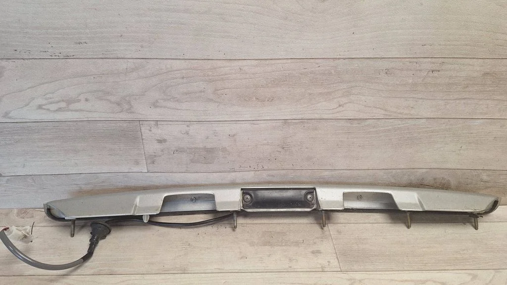 Trunk door license plate light bar 7681105010