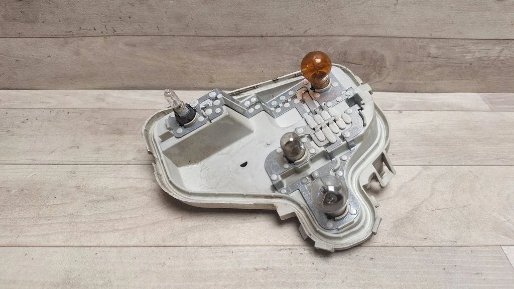 Tail light bulb cover holder 8P0945257