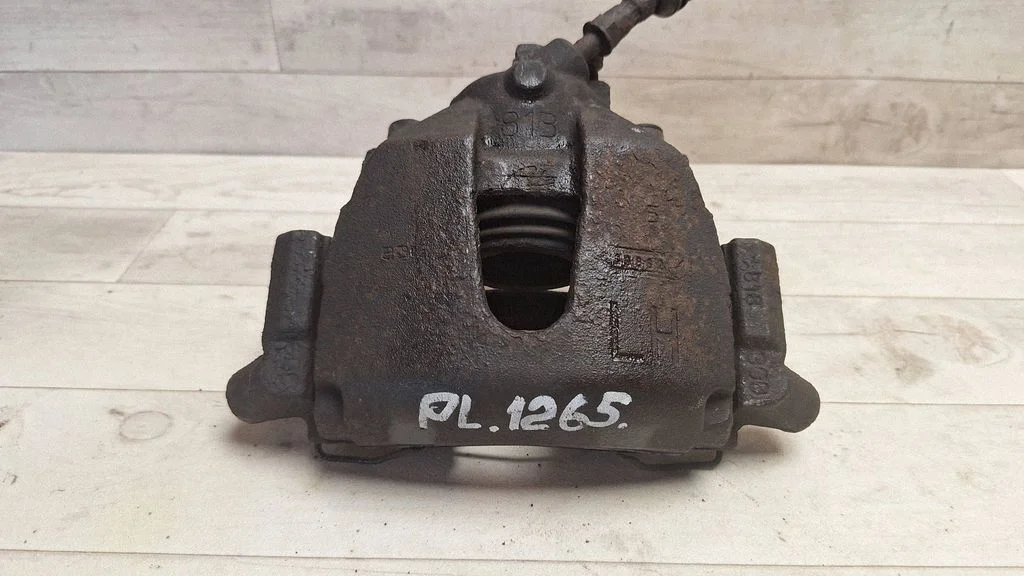 Front brake caliper – front left