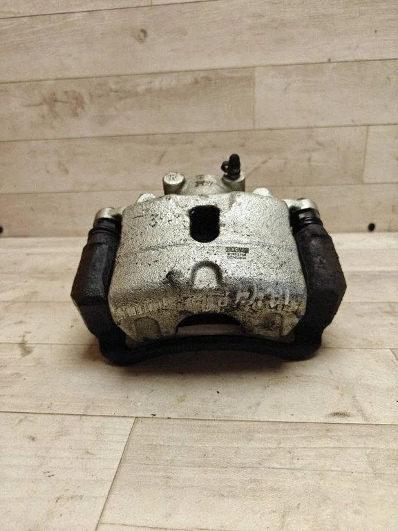 Front brake caliper – front right