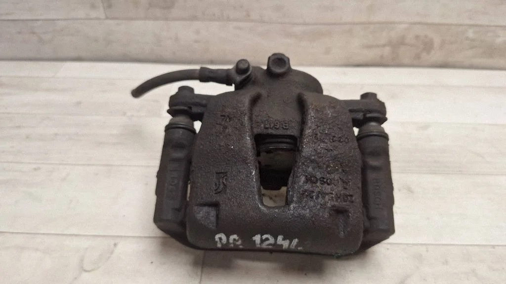 Front brake caliper – front right