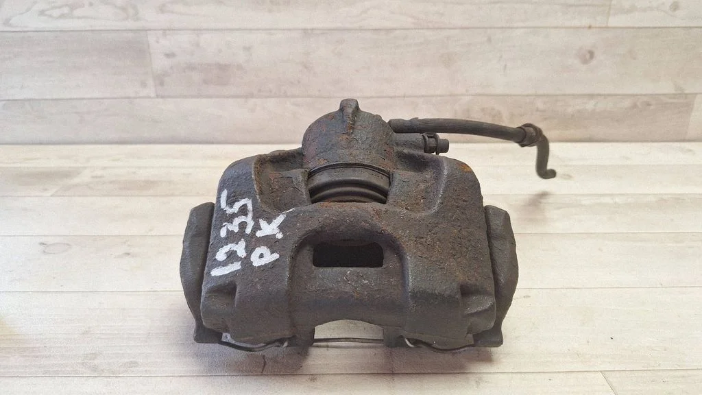 Front brake caliper – front left