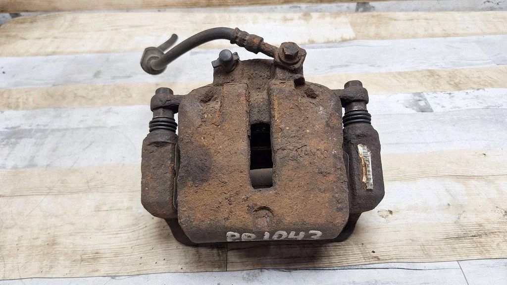 Front brake caliper – front right