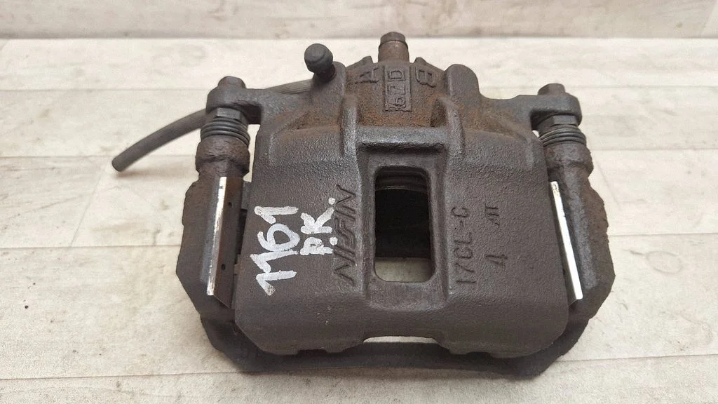 Front brake caliper – front left