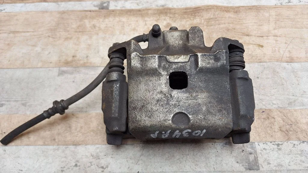 Front brake caliper – front right