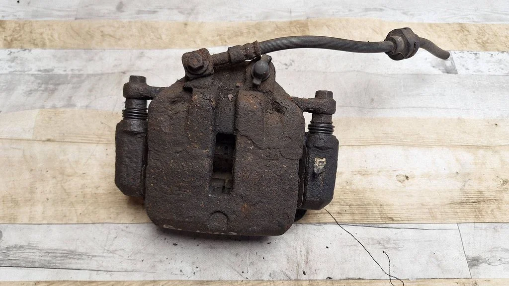 Front brake caliper – front left