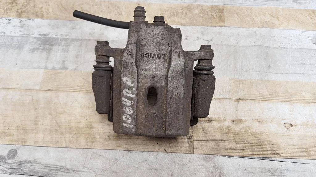 Front brake caliper – front right