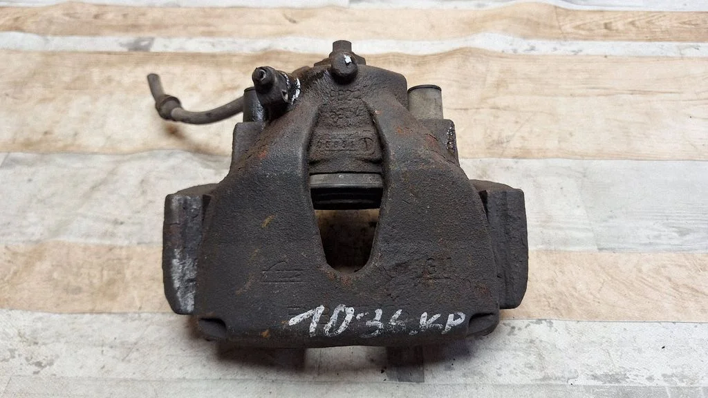 Front brake caliper – front left