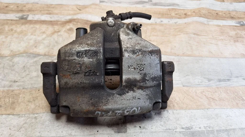 Front brake caliper – front left