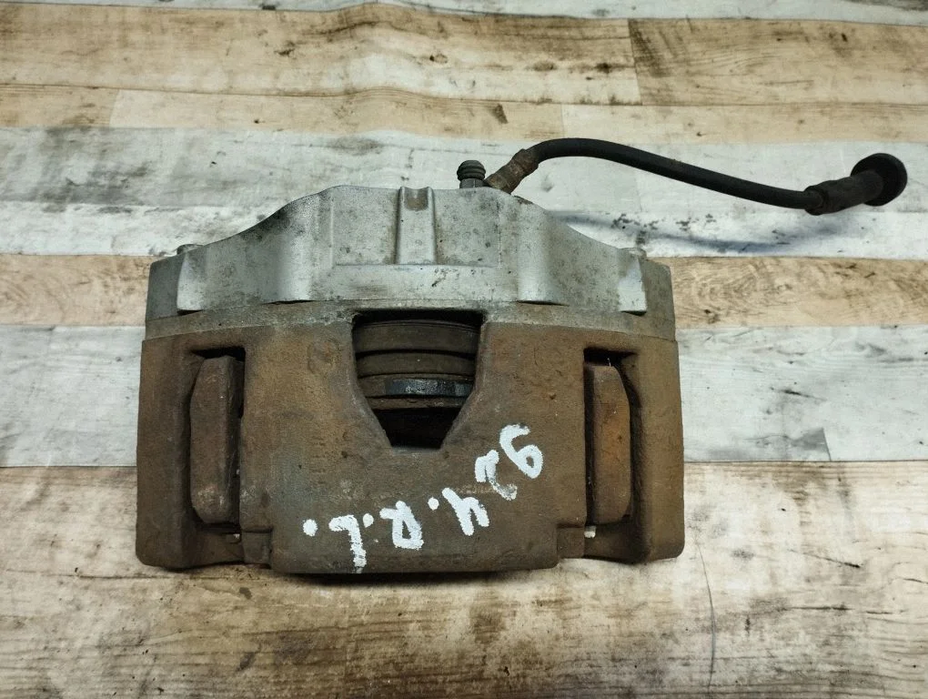 Front brake caliper 30657303