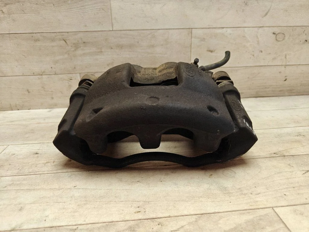 Front brake caliper – front left