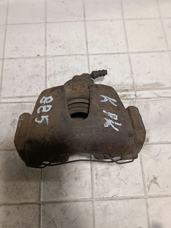 Front brake caliper – front left