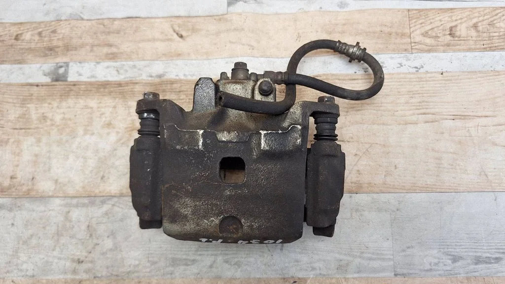 Front brake caliper – front left