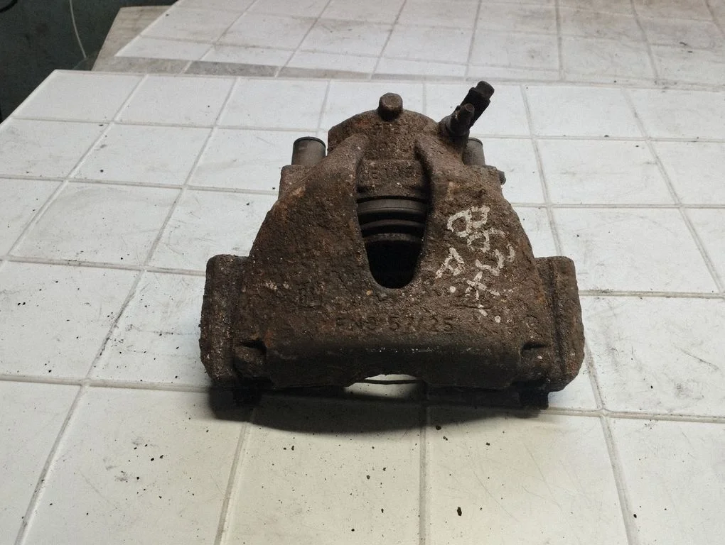 Front brake caliper – front left