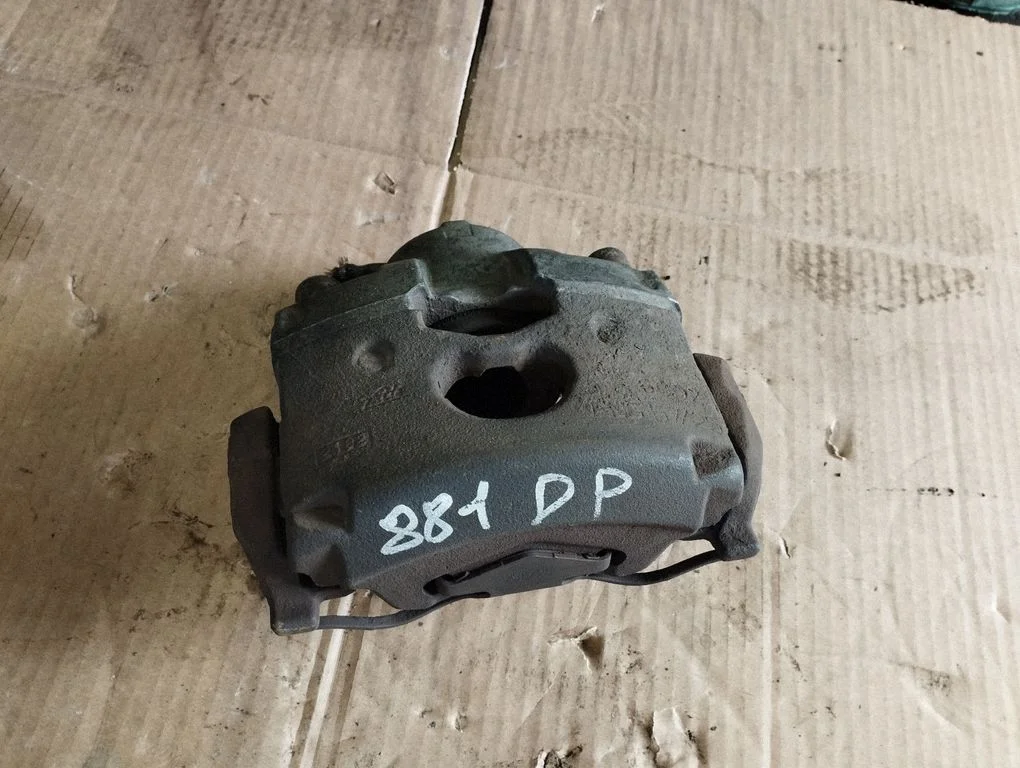 Front brake caliper – front right