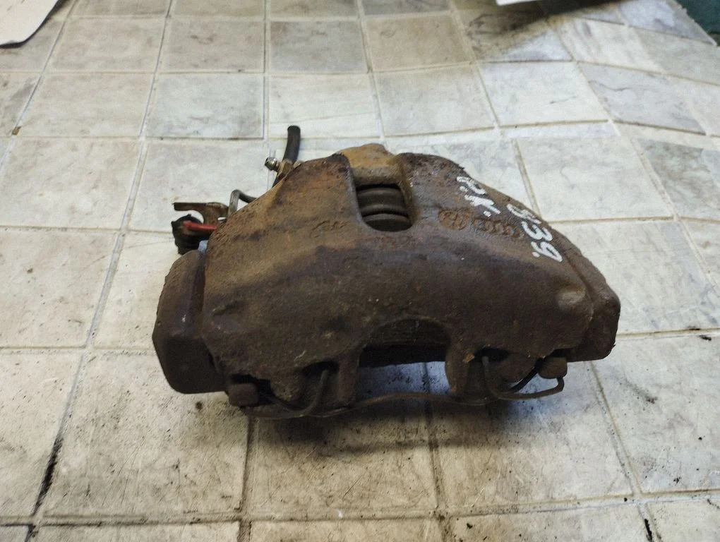 Front brake caliper – front left