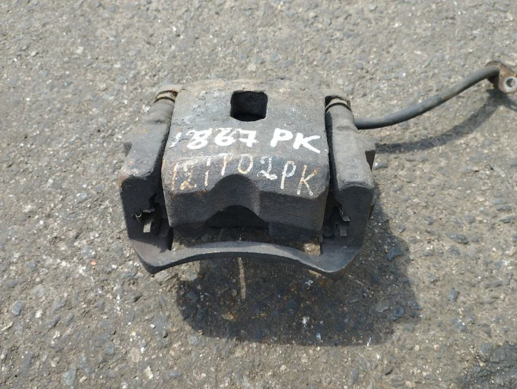 Front brake caliper – front left