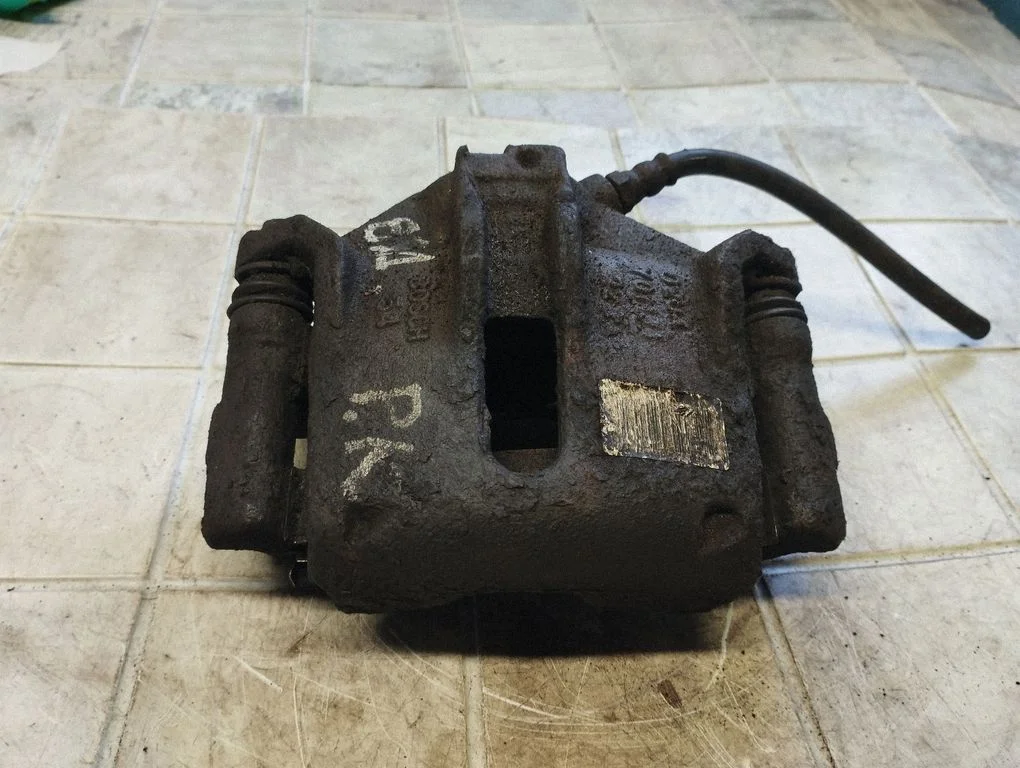 Front brake caliper – front left