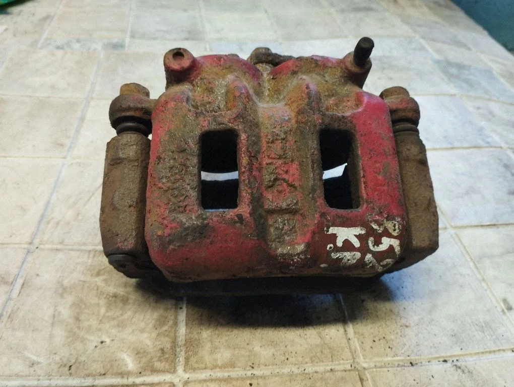 Front brake caliper – front left