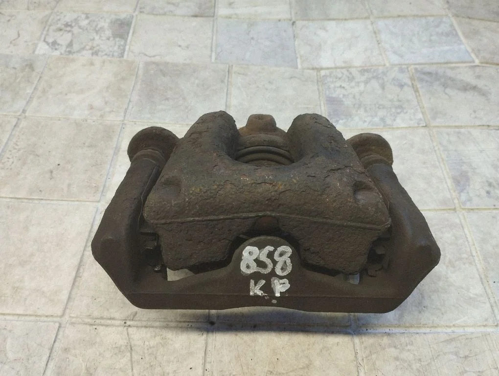 Front brake caliper – front left