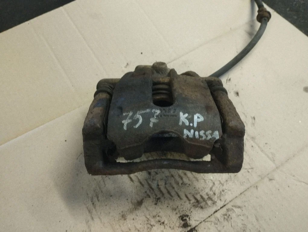 Front brake caliper – front left