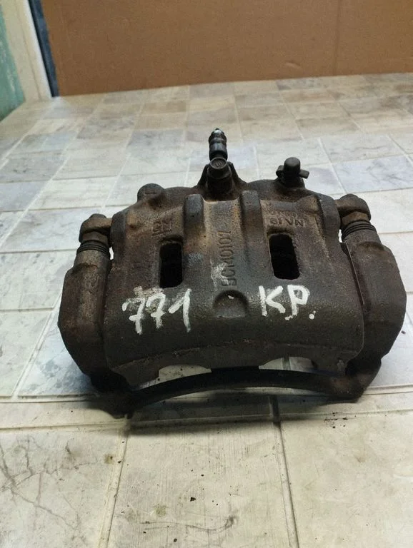 Front brake caliper – front left
