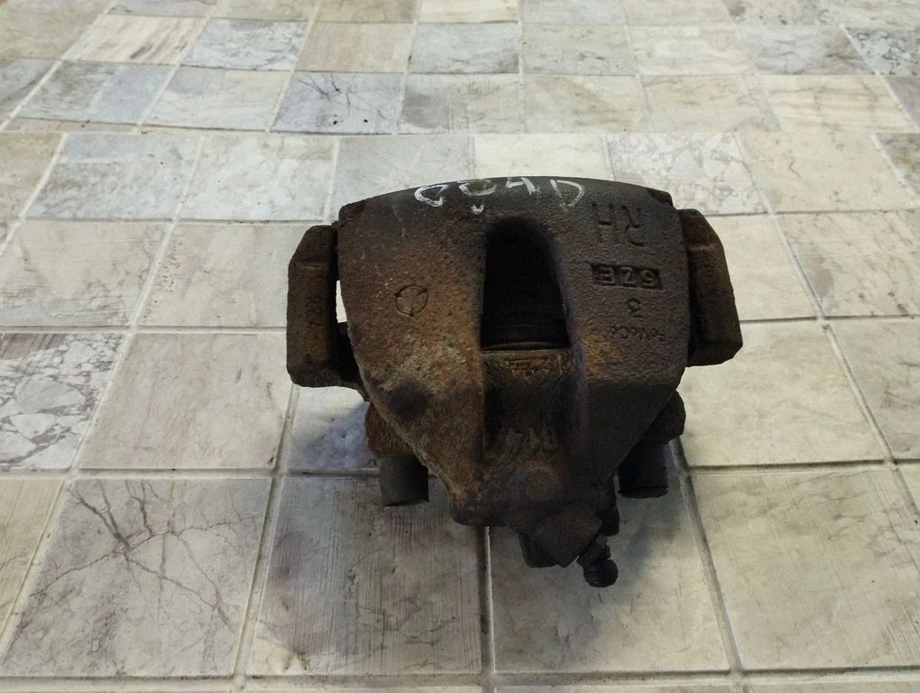 Front brake caliper – right