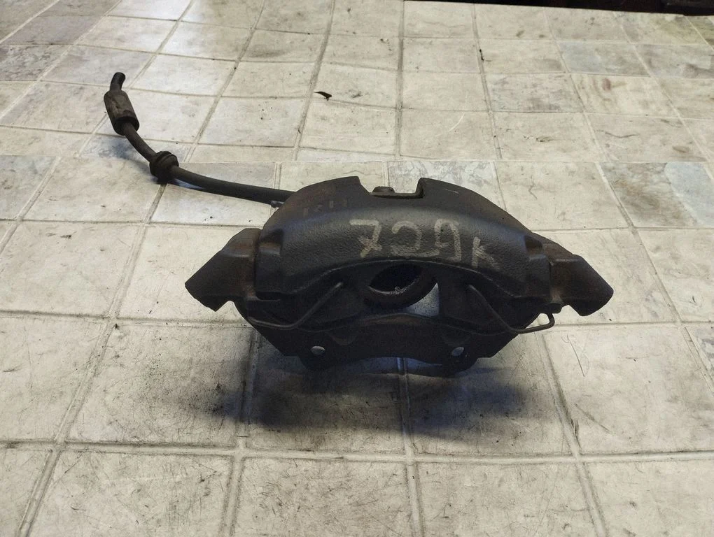 Front brake caliper – front left