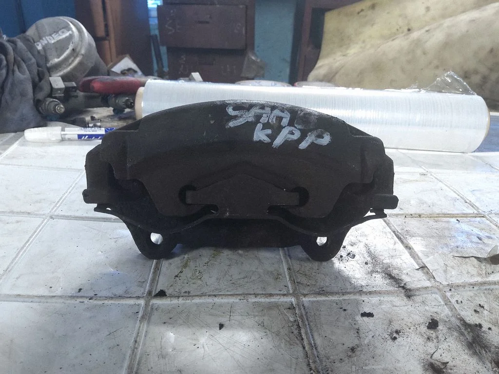 Front brake caliper – front left
