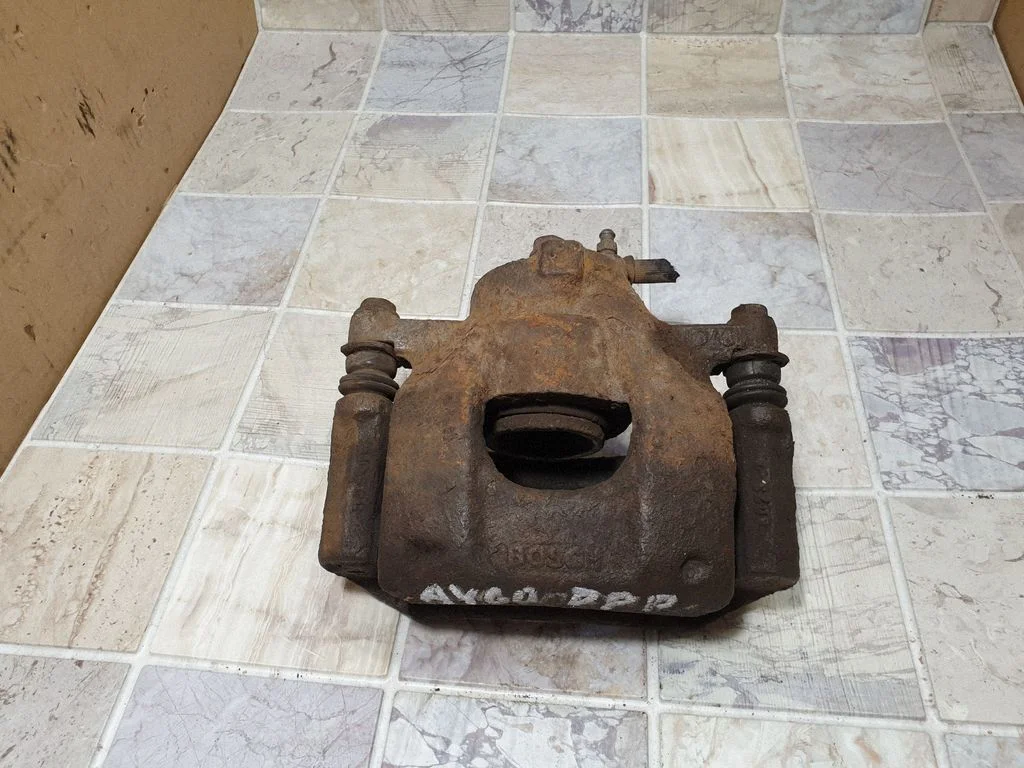 Front brake caliper – front left