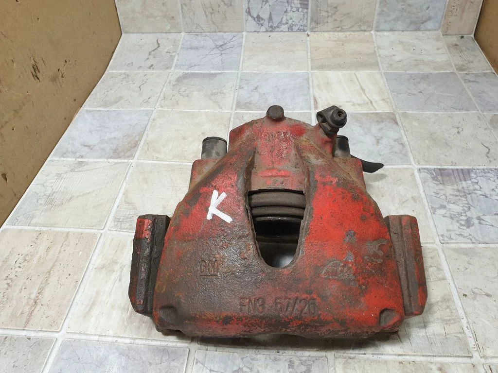 Front brake caliper – front left