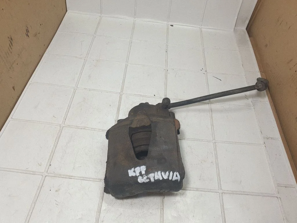 Front brake caliper – front left