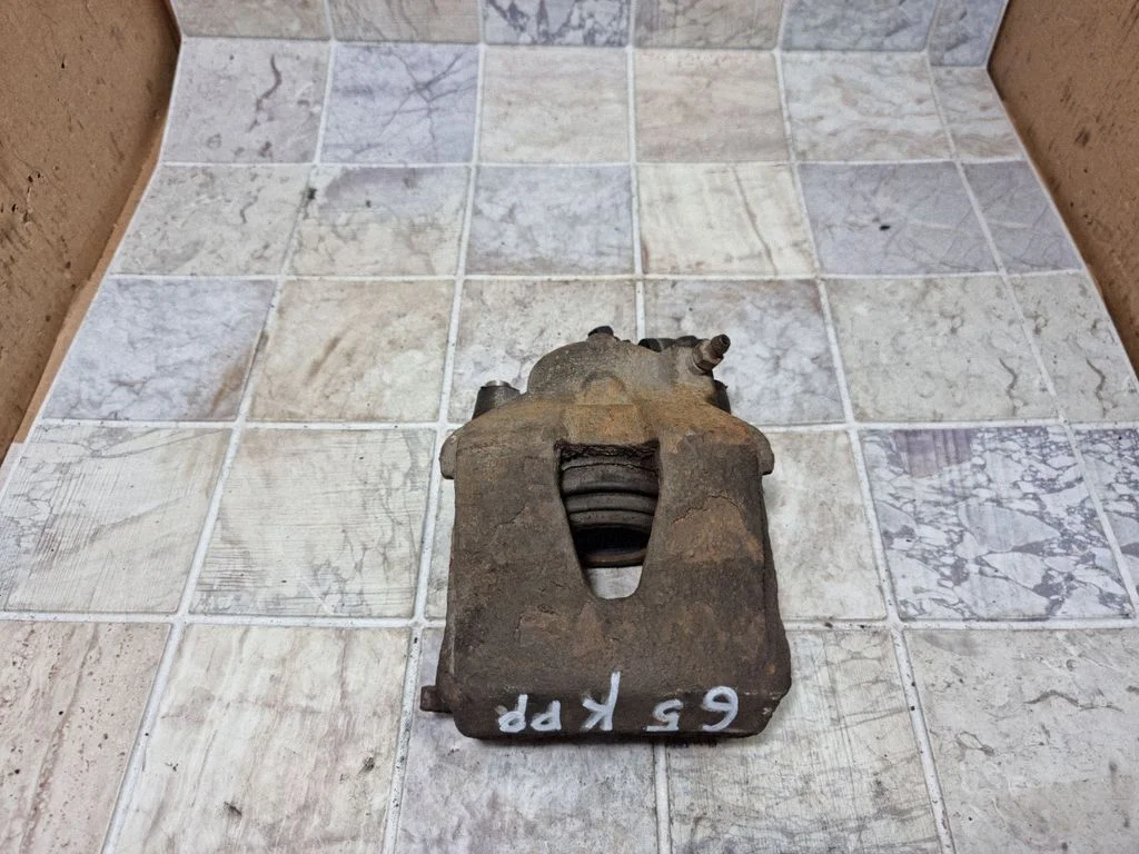 Front brake caliper – front left