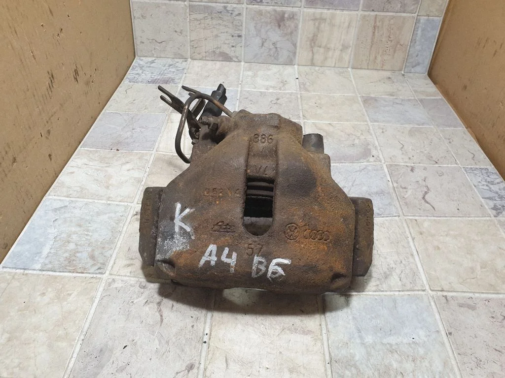 Front brake caliper – front left