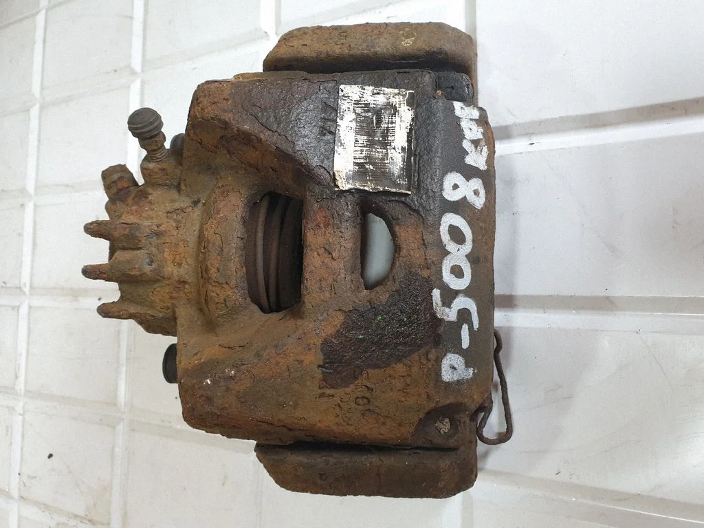 Front brake caliper – front left
