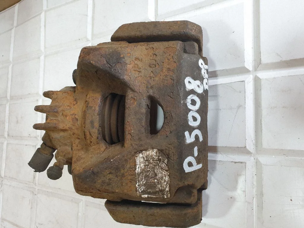 Front brake caliper – front right
