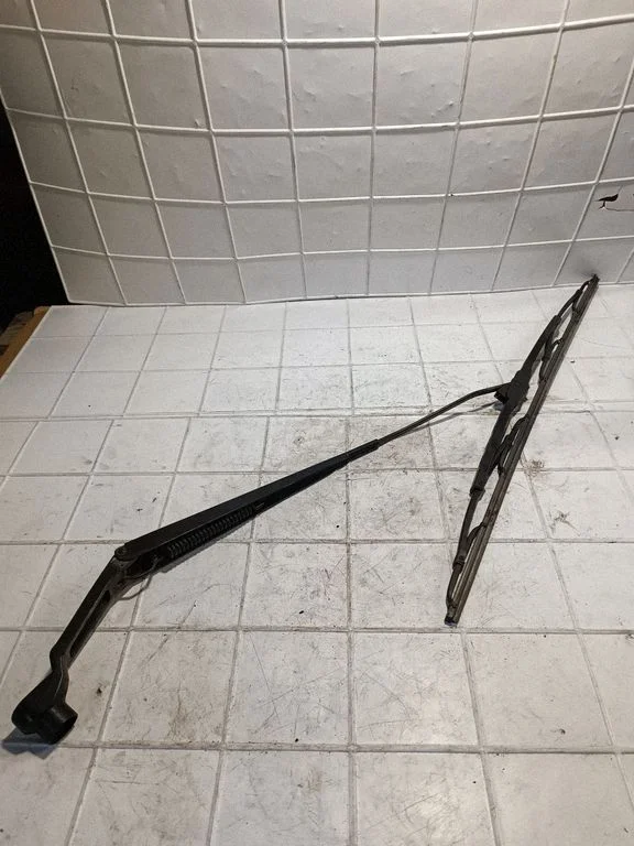 Front wiper blade arm – front left