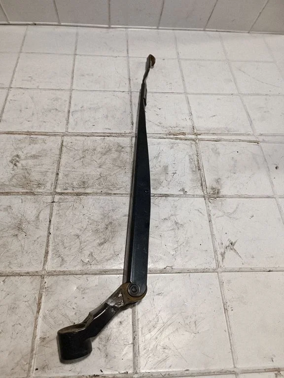 Front wiper blade arm – front left