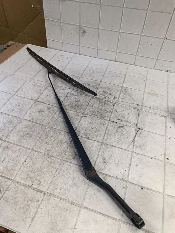Front wiper blade arm – front left