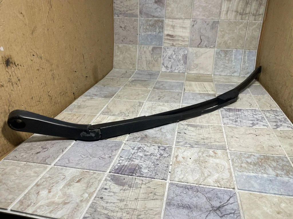 Front wiper blade arm – front left