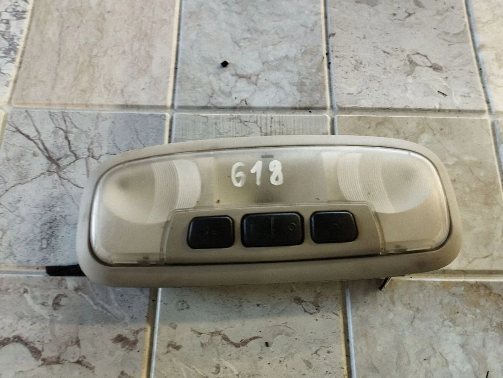 Front seat light 8A6A13K767AA34X1