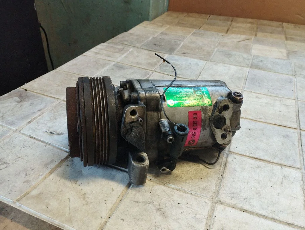 Air conditioning (A/C) compressor (pump) 9805114153