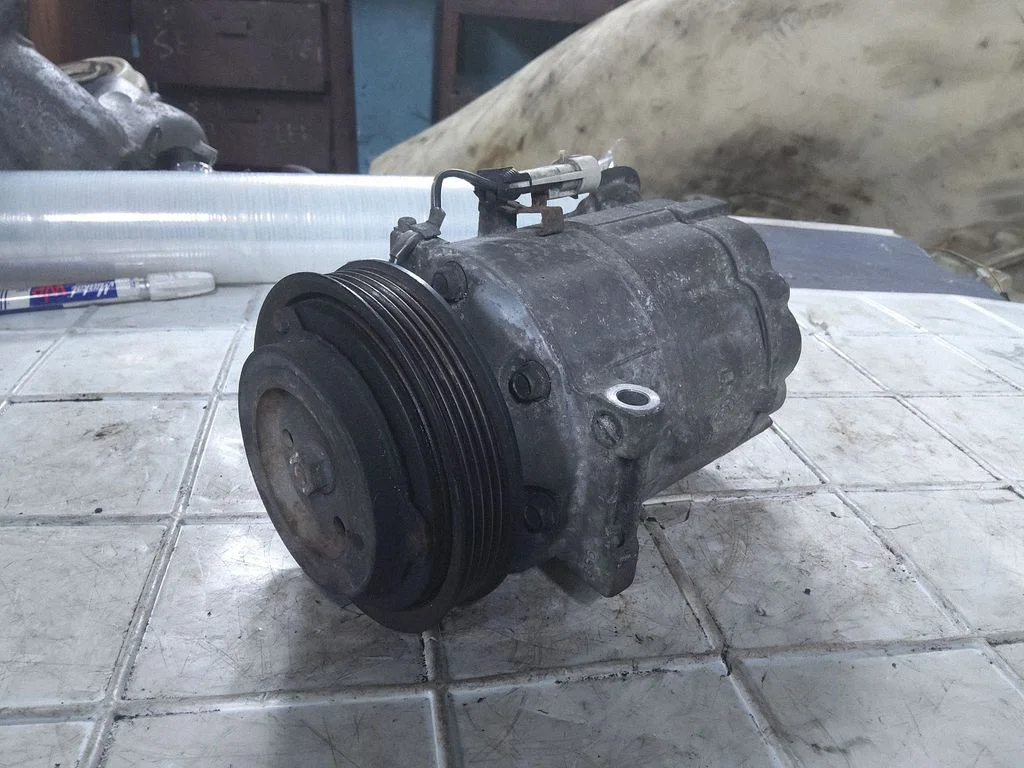 Kliimakompressor (pump) – Saab 9-3 Ver2 (2003-2007)