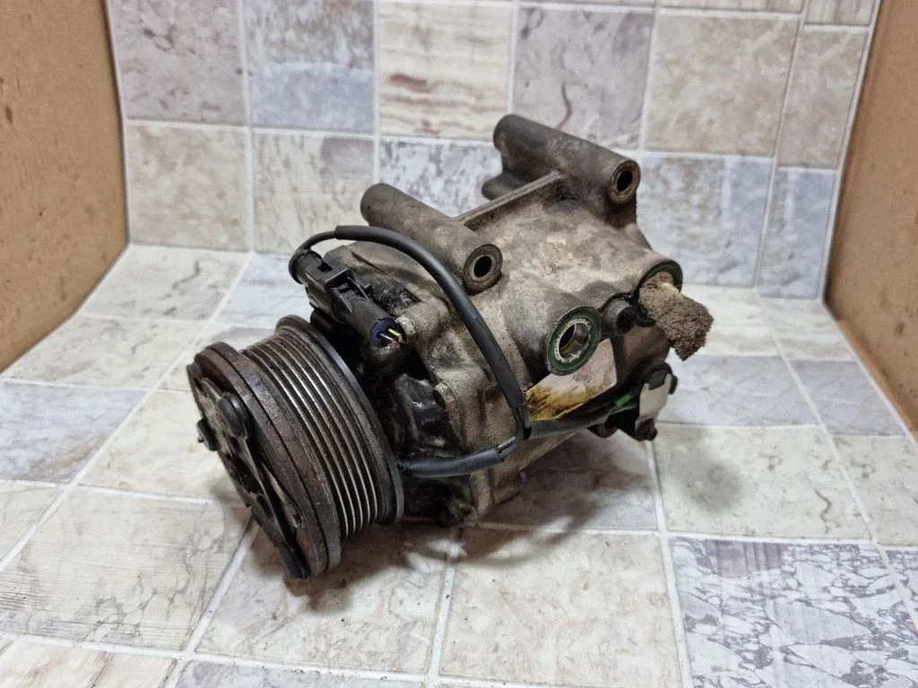 Air conditioning (A/C) compressor (pump) 1S7H19D629