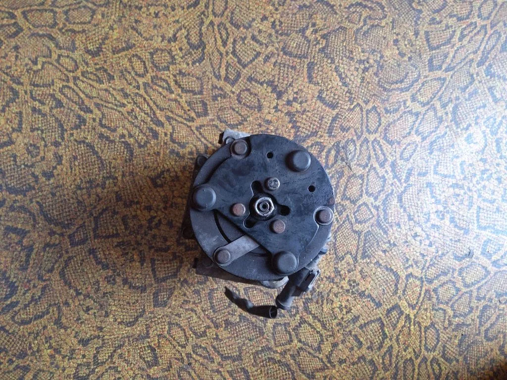 Air conditioning (A/C) compressor (pump) YS4H19D629AB