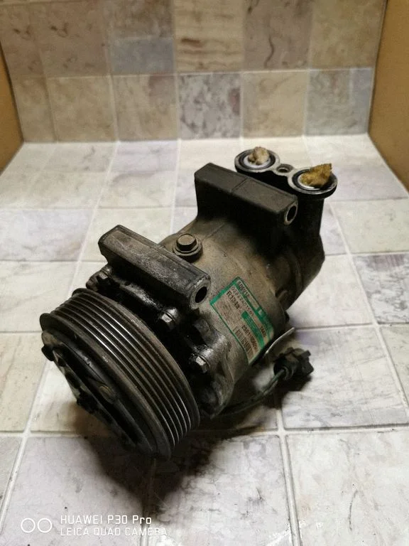 Air conditioning (A/C) compressor (pump) 2S6119D629AE