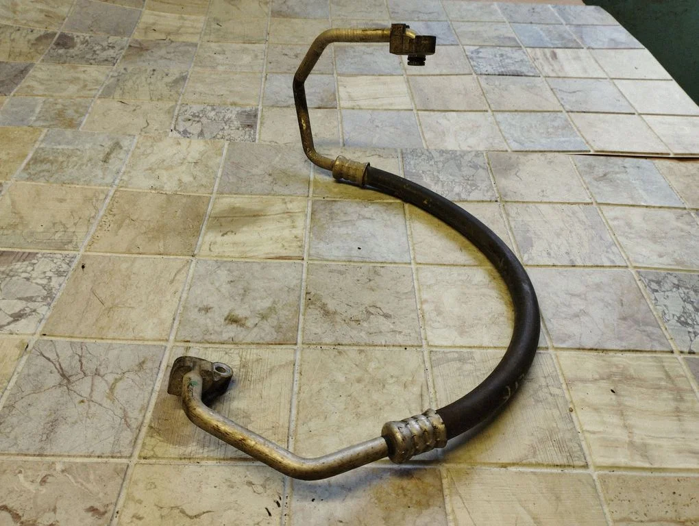 Air conditioning (A/C) pipe/hose