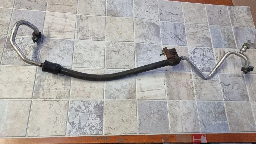Air conditioning (A/C) pipe/hose 23CHDJ