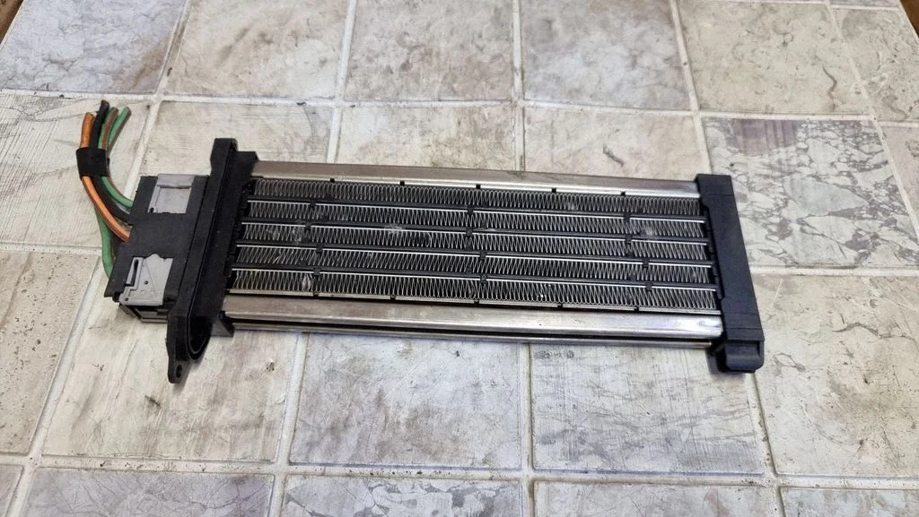 Elektryczna nagrzewnica kabiny 664447AE