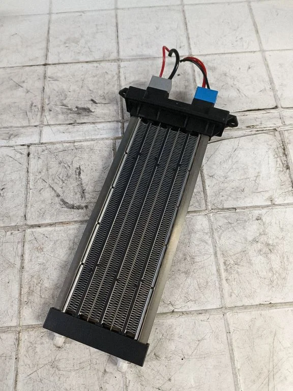 Elektryczna nagrzewnica kabiny 52410334